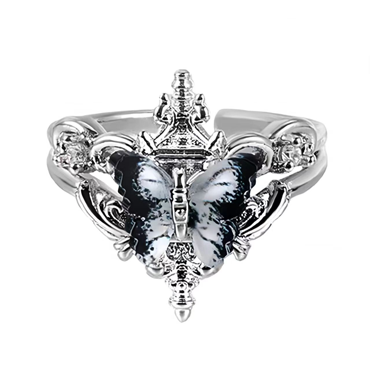 Silver ring with butterfly design on a black background